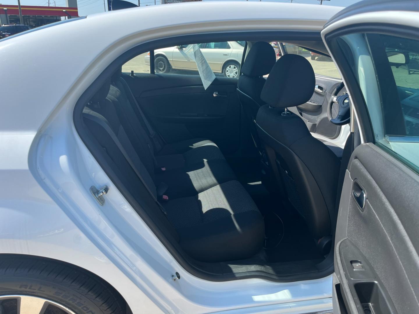 2012 white /black Chevrolet Malibu 1LT (1G1ZC5EU4CF) with an 2.4L L4 DOHC 16V FFV engine, 6-Speed Automatic transmission, located at 14700 Tomball Parkway 249, Houston, TX, 77086, (281) 444-2200, 29.928619, -95.504074 - Photo#12